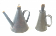 Two early tin miner's oil lamps