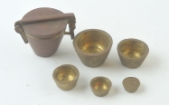 Nesting set of brass cup weights